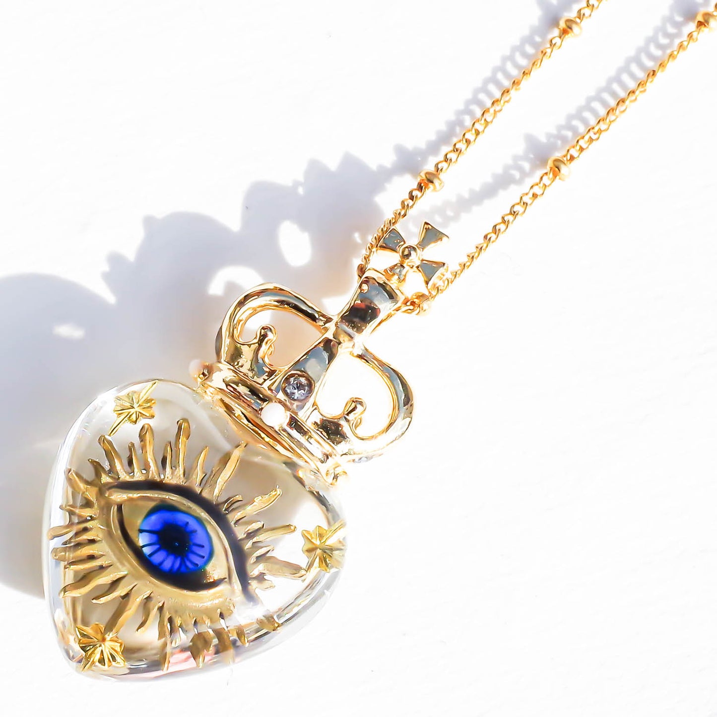 EYE SMALL HEART NECKLACE / CLEAR