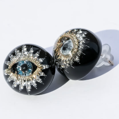 Guardian starburst eye earrings - black × gold