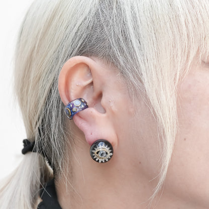 Guardian starburst eye earrings - black × gold