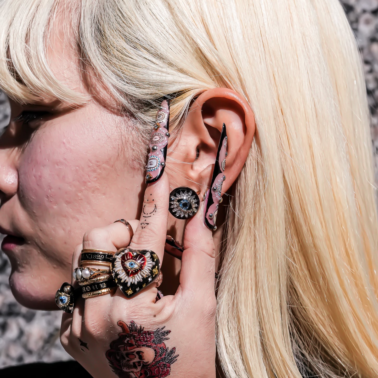 Guardian starburst eye earrings - black × gold