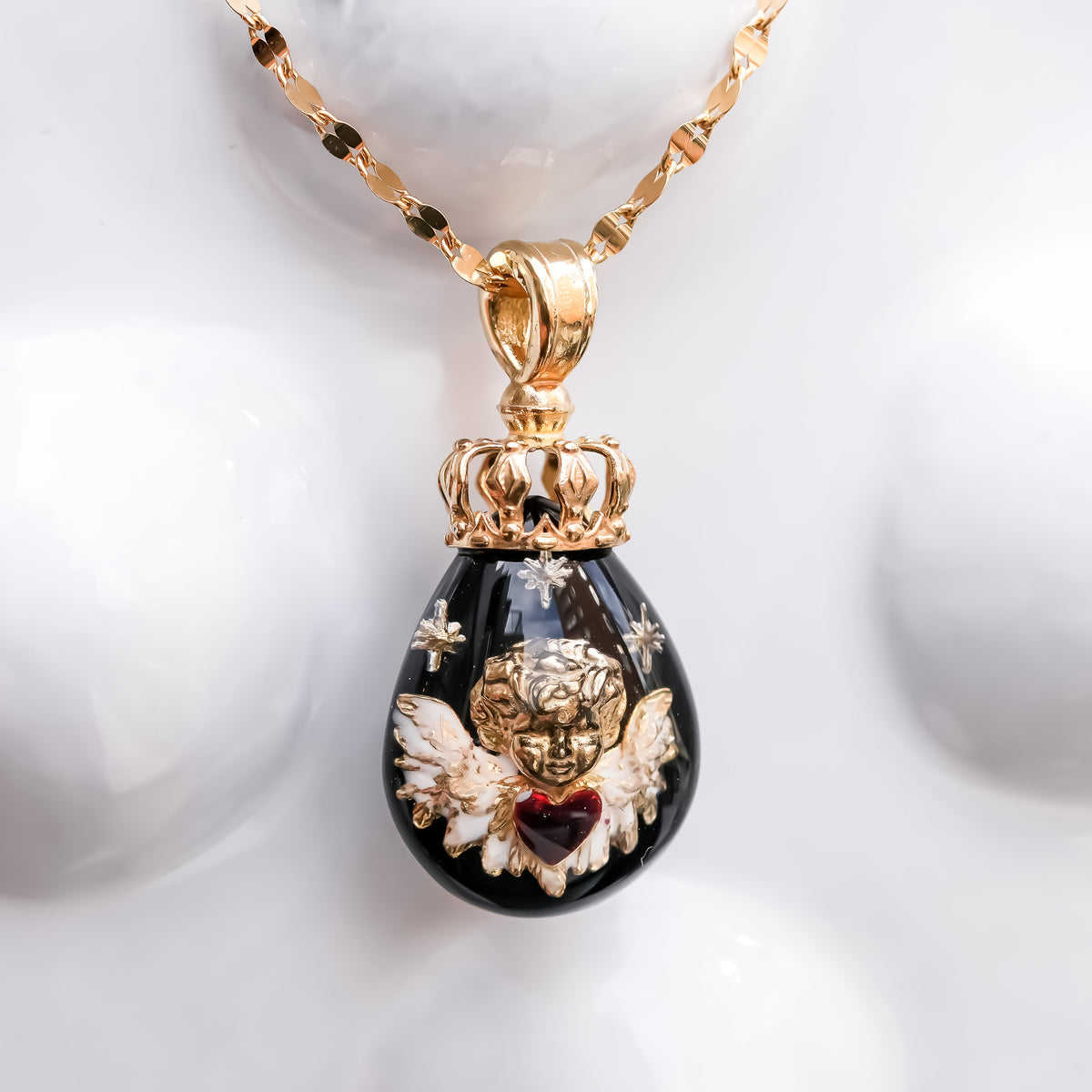 The Crowned Cherub Drop Necklace - Black × Gold