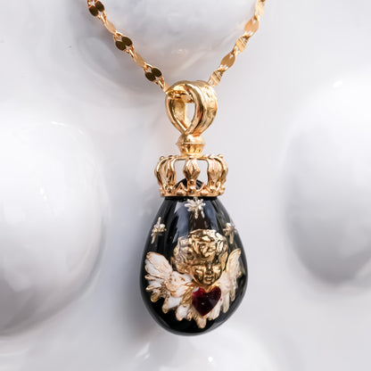 The Crowned Cherub Drop Necklace - Black × Gold