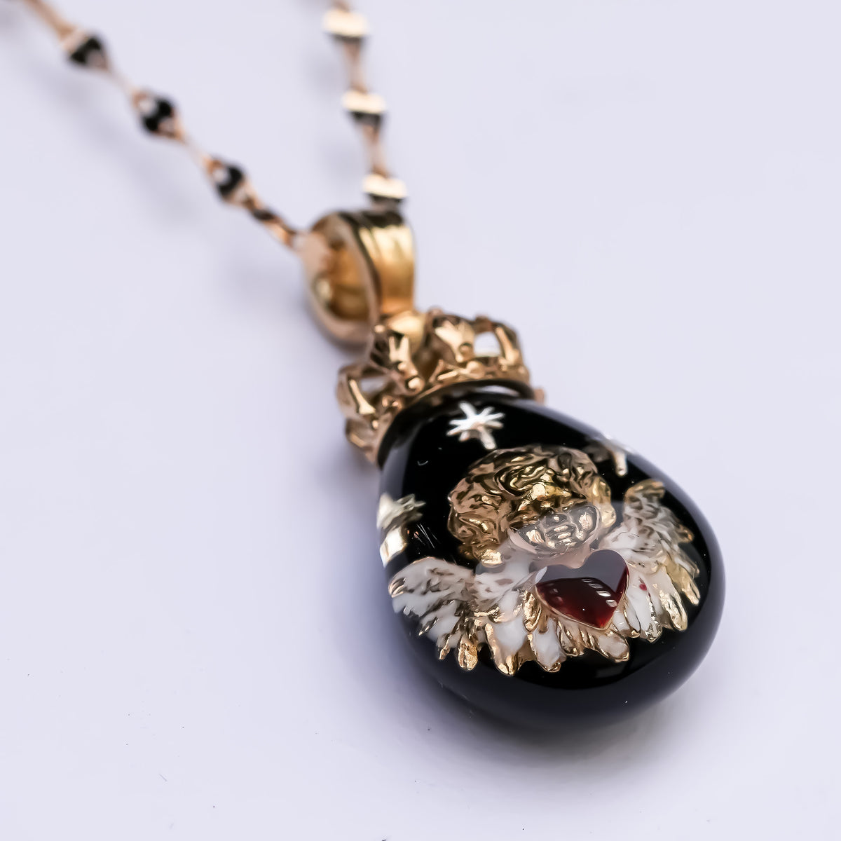 The Crowned Cherub Drop Necklace - Black × Gold