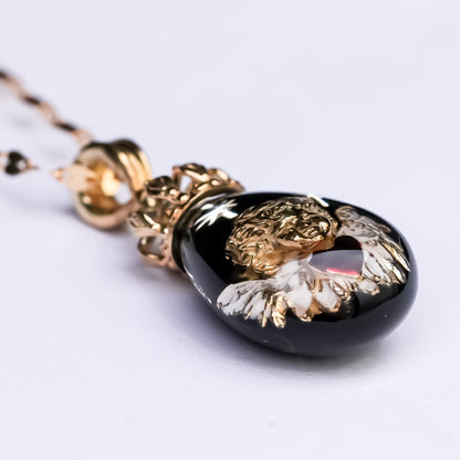 The Crowned Cherub Drop Necklace - Black × Gold