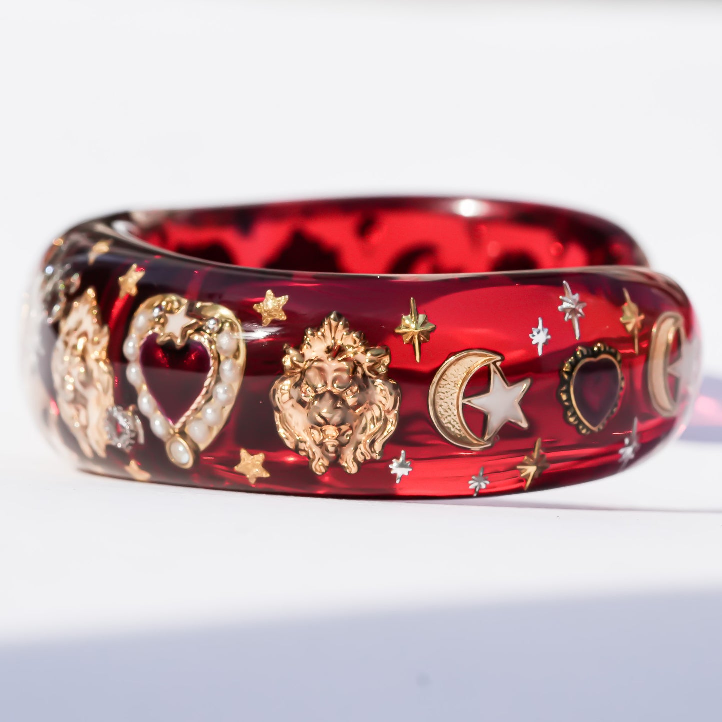 Crowned lion heart bracelet - red