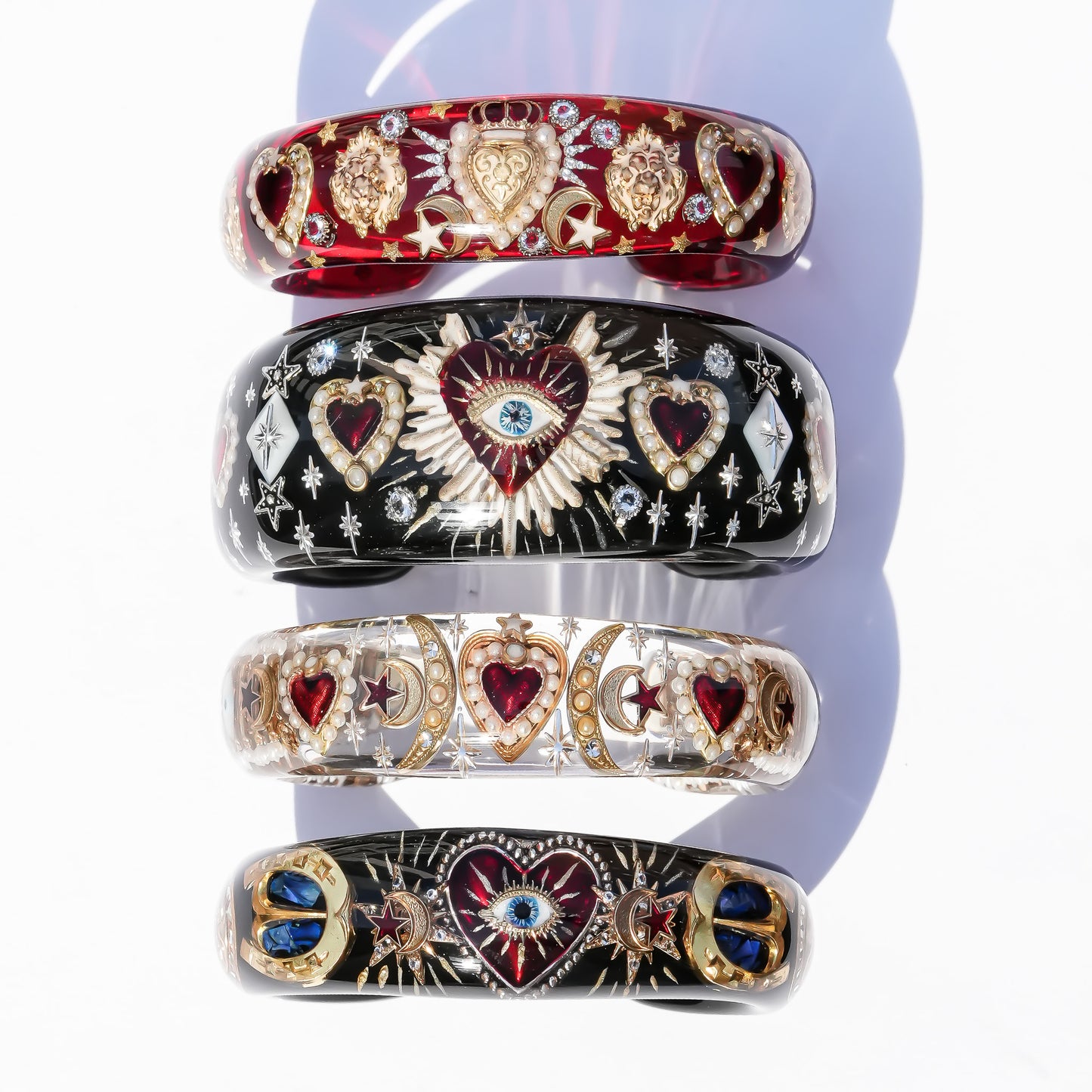 Crowned lion heart bracelet - red