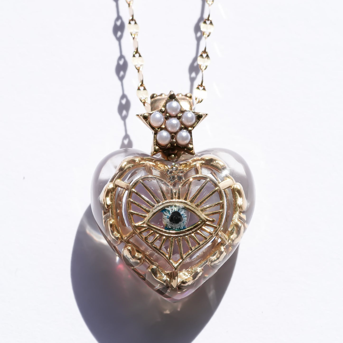 Aurora opal heart eye necklace -clear