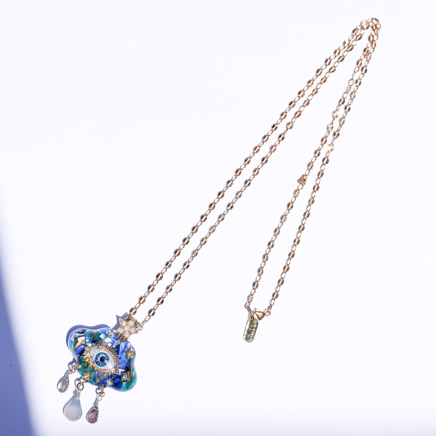 Mystic rain cloud necklace -Blue green